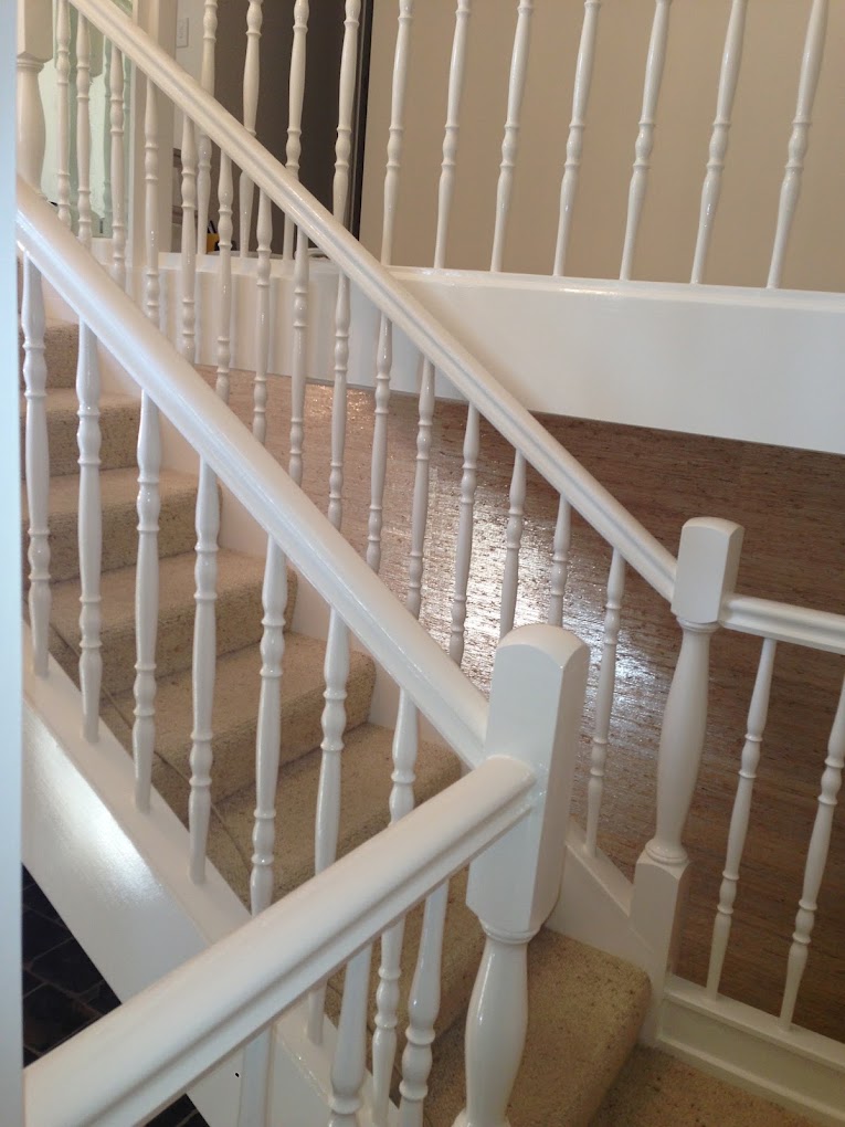 Internal timber balustrade and handrail finished in white gloss enamel