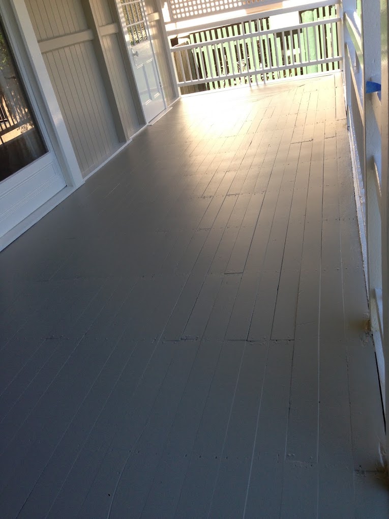 Verandah floorboards repainted in a smooth grey deck finish